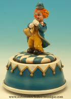 Clowns automates musicaux Clown automate musical : bo&icirc;te &agrave; musique avec clown au saxophone