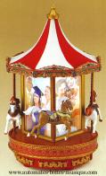 Grands carrousels musicaux miniatures Carrousel musical miniature Mr Christmas en r&eacute;sine et toile : carrousel musical miniature pour photos