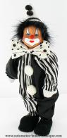 Clowns automates musicaux Clown automate musical en porcelaine : clown automate musical noir