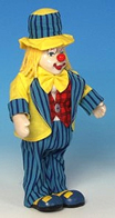 Clowns automates musicaux Clown automate musical en porcelaine : clown automate musical jaune et bleu