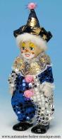 Clowns automates musicaux Clown automate musical en porcelaine : clown automate musical bleu et argent