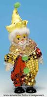 Clowns automates musicaux Clown automate musical en porcelaine : clown automate musical jaune et rouge