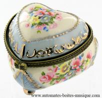 Bo&icirc;tes &agrave; drag&eacute;es musicales en porcelaine Bo&icirc;te &agrave; drag&eacute;es musicale en porcelaine : bo&icirc;te &agrave; drag&eacute;es avec fleurs color&eacute;es