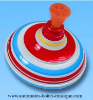 Jouets m&eacute;caniques en m&eacute;tal, t&ocirc;le et fer blanc Jouet m&eacute;canique en m&eacute;tal, t&ocirc;le et fer blanc : jouet toupie bleu blanc rouge en m&eacute;tal