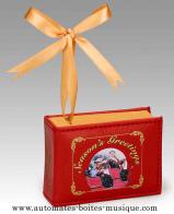 Livres musicaux miniatures Livre musical miniature &eacute;lectrique en cuir avec sc&egrave;ne anim&eacute;e : traineaux autour d'un sapin