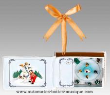 Livres musicaux miniatures Livre musical miniature &eacute;lectrique en cuir avec sc&egrave;ne anim&eacute;e : patineurs autour d'un bonhomme de neige