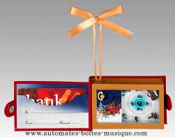 Bo&icirc;tes &agrave; musique miniature "Bons pour cadeaux" Bo&icirc;te &agrave; musique miniature avec bon pour cadeaux : bo&icirc;te &agrave; musique avec patineurs autour d'un sapin