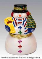 Bo&icirc;tes &agrave; musique anim&eacute;es de No&euml;l en porcelaine Bo&icirc;te &agrave; musique anim&eacute;e de No&euml;l en porcelaine Mr Christmas : bo&icirc;te &agrave; musique Bonhomme de neige