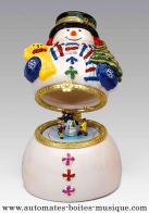 Bo&icirc;tes &agrave; musique anim&eacute;es de No&euml;l en porcelaine Bo&icirc;te &agrave; musique anim&eacute;e de No&euml;l en porcelaine Mr Christmas : bo&icirc;te &agrave; musique Bonhomme de neige