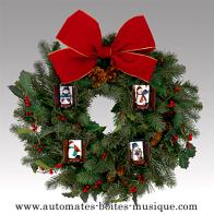 Automates musiciens de No&euml;l Automate musicien de No&euml;l Mr Christmas : couronne d&eacute;corative avec bonhommes de neige musiciens