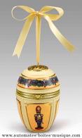 Faberg&eacute; style porcelain musical eggs .