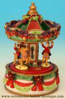 Carrousels musicaux miniatures de No&euml;l Carrousel musical miniature de No&euml;l : carrousel musical miniature avec p&egrave;res No&euml;l sur chevaux