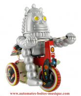 Jouets en m&eacute;tal, t&ocirc;le et fer blanc : robots m&eacute;caniques en m&eacute;tal Robot m&eacute;canique en m&eacute;tal, t&ocirc;le et fer blanc : robot m&eacute;canique en m&eacute;tal "Robot au tricycle"
