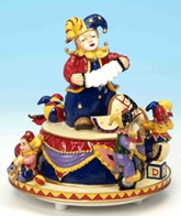 Jouets musicaux en porcelaine/polystone Jouet musical en polystone : jouet automate musical avec bouffons