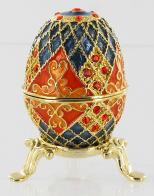Oeufs non musicaux de style Faberg&eacute; en m&eacute;tal Oeuf non musical de style Faberg&eacute; en m&eacute;tal et strass : oeuf-&eacute;crin non musical rouge et bleu