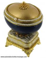 Oeufs musicaux en v&eacute;ritable coquille d'oeuf de style Faberg&eacute; Oeuf musical de style Faberg&eacute; en v&eacute;ritable coquille d'oeuf : oeuf musical bleu