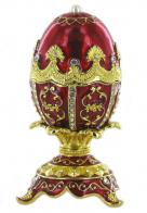 Oeufs musicaux en métal de style Fabergé Oeuf musical de style Fabergé en métal: oeuf musical rouge avec dorures, strass et 4 pieds