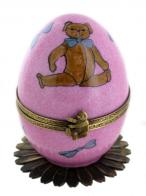 Oeufs musicaux de style Fabergé fabriqués en France Oeuf musical de style Fabergé fabriqué en France: oeuf musical en porcelaine avec ours en peluche