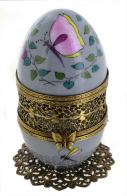 Oeufs musicaux de style Fabergé fabriqués en France Oeuf musical de style Fabergé en porcelaine de Limoges en forme de cage avec oiseau - La lettre à Elise