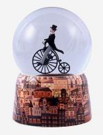 Boules à neige musicales classiques (en stock) Boule à neige musicale animée avec globe en verre et base en porcelaine: boule à neige avec homme distingué sur un grand-bi