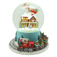 Boules à neige musicales de Noël disponibles sur commande (nous contacter) Boule à neige musicale de Noël avec globe en verre, Père Noël dans son traineau volant et train tournant