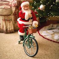 Automates musicaux de Noël (disponibles sur commande) Automate musical de Noël Mr Christmas: Père Noël automate avec clochette sur une bicyclette