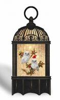 Boules à neige musicales de Noël disponibles sur commande (nous contacter) Boule à neige musicale de Noël en forme de cage à oiseaux avec paillettes et harfangs des neiges