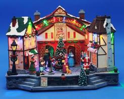 Automates musicaux de Noël (disponibles sur commande) Automate musical de Noël avec scène de village, sapin, personnages, lumières et musiques électroniques