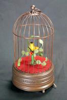 Oiseaux chanteurs automates mécaniques Oiseau chanteur mécanique : 1 oiseau chanteur automate dans cage ancienne
