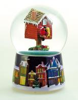Boules à neige musicales de Noël disponibles sur commande (nous contacter) Boule à neige musicale de Noël avec globe en verre et oiseaux perchés sur un abrit pour oiseaux
