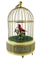 Automates vendus Automate oiseau chanteur mécanique dans une cage dorée avec base en métal décorée de putti