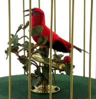 Automates vendus Automate oiseau chanteur mécanique dans une cage dorée avec base en métal décorée de putti