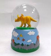 Boules à neige musicales classiques Boule à neige musicale animée avec globe en verre, paillettes et dinosaure (triceratops) -