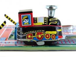 Jouets mécaniques en métal, tôle ou fer blanc Jouet mécanique en métal, tôle et fer blanc : jouet mécanique train dans la ville