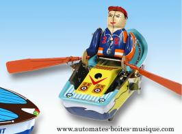 Jouets mécaniques en métal, tôle ou fer blanc Jouet mécanique en métal, tôle et fer blanc : jouet mécanique bateau avec personnage