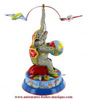 Jouets mécaniques en métal, tôle ou fer blanc non disponibles Jouet mécanique en métal, tôle et fer blanc : jouet mécanique éléphant avec avions