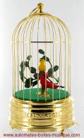 Oiseaux chanteurs automates mécaniques Oiseaux chanteurs mécaniques : 2 oiseaux chanteurs automates dans une cage dorée