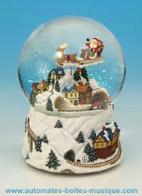 Boules à neige musicales de Noël disponibles sur commande (nous contacter) Boule à neige musicale de Noël : boule à neige musicale avec train circulant et Père Noël volant