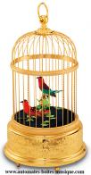 Oiseaux chanteurs automates mécaniques Automate oiseaux chanteurs mécaniques Reuge : 2 oiseaux chanteurs automates dans une cage à la finition dorée