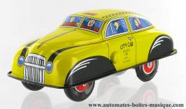 Jouets mécaniques en métal, tôle ou fer blanc non disponibles Jouet mécanique en métal, tôle et fer blanc agrafé : jouet mécanique "Voiture jaune à friction"