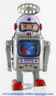 Jouets en métal, tôle ou fer blanc : robots mécaniques en métal Robot mécanique en métal, tôle et fer blanc : robot mécanique en métal "Petit robot astronaute"