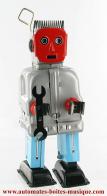 Jouets en métal, tôle ou fer blanc : robots mécaniques en métal Robot mécanique en métal, tôle et fer blanc : robot mécanique en métal "Robot au visage rouge"