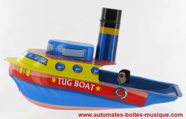 Jouets en métal, tôle ou fer blanc: bâteaux pop-pop Bateau pop-pop en métal, tôle et fer blanc agrafé : jouet bateau pop-pop avec cheminée et personnage