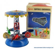 Jouets mécaniques en métal, tôle ou fer blanc non disponibles Jouet mécanique en métal :  carrousel de capsules spatiales en métal, tôle et fer blanc