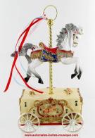 Animaux automates musicaux Cheval automate musical avec remontoir : cheval automate tournant sur un chariot