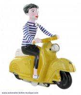 Jouets mécaniques en métal, tôle ou fer blanc non disponibles Jouet mécanique en métal, tôle et fer blanc : jouet mécanique "Femme sur vespa"