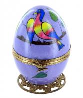 Oeufs musicaux de style Fabergé fabriqués en France Oeuf musical de style Fabergé en porcelaine de Limoges avec oiseau - Roméo et Juliette (Nino Rota)