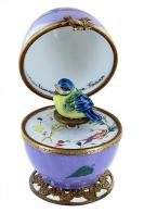 Oeufs musicaux de style Fabergé fabriqués en France Oeuf musical de style Fabergé en porcelaine de Limoges avec oiseau - Roméo et Juliette (Nino Rota)