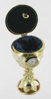 Oeufs musicaux en métal de style Fabergé Oeuf musical de style Fabergé en métal : oeuf musical marron avec montre à quartz