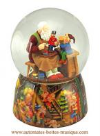 Boules à neige musicales Boule à neige musicale de Noël : boule à neige avec Père Noël et lutin dans l'atelier du Père Noël